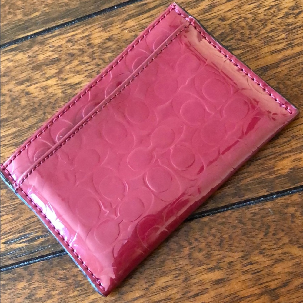Burgundy authentic Coach card holder